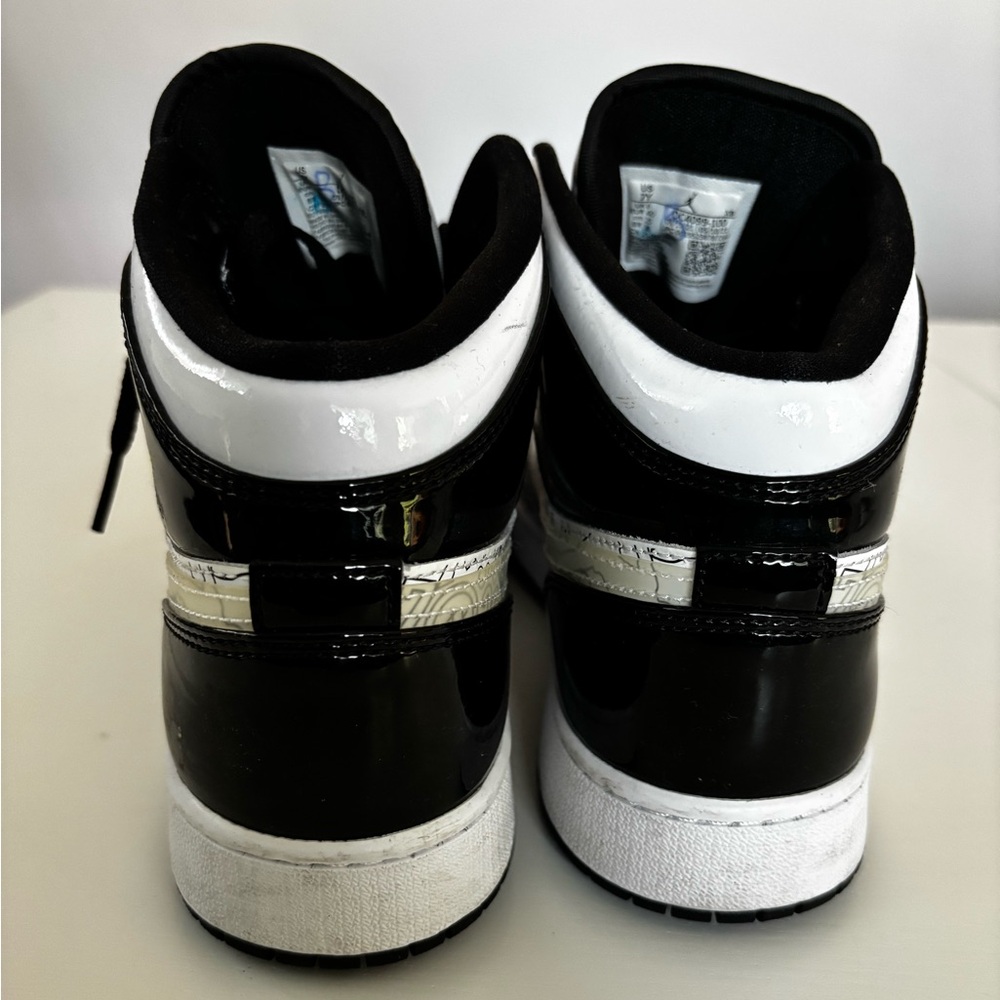 Jordan Black and White Retro High-Top Sneakers